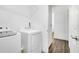 Laundry room with matching washer and dryer; perfect for any home owner at 9295 Melody Cir, Port Charlotte, FL 33981