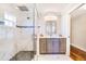 Elegant bathroom showcasing a spacious walk-in shower, sleek vanity, and contemporary finishes for a modern aesthetic at 10233 St Paul Dr, Port Charlotte, FL 33981