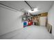 Well-organized garage with ample storage and a clean, epoxy-coated floor at 14271 Heritage Landing Blvd # 1516, Punta Gorda, FL 33955