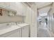 Efficient laundry room with a washer, dryer, and convenient upper cabinet storage at 14271 Heritage Landing Blvd # 1516, Punta Gorda, FL 33955