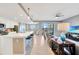 Open-concept living space flows from kitchen to comfortable living room with lake views at 14271 Heritage Landing Blvd # 1516, Punta Gorda, FL 33955
