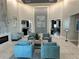 Community lobby with fireplace, ample seating, and views into the dining area through open doorways at 14271 Heritage Landing Blvd # 1516, Punta Gorda, FL 33955