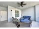 This spacious patio features a ceiling fan, stylish furniture, and tranquil views at 14271 Heritage Landing Blvd # 1516, Punta Gorda, FL 33955