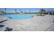 An inviting pool with a spacious deck and an accessible entry point at 14271 Heritage Landing Blvd # 1516, Punta Gorda, FL 33955