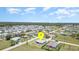 Aerial view of a home nestled in a vibrant community with lush landscaping at 16031 Hesta Misty Ct, Punta Gorda, FL 33955
