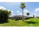 Enjoy Florida living in this home with its expansive backyard, lush landscaping and screened lanai at 1612 Blue Lake Cir, Punta Gorda, FL 33983