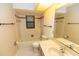 Bathroom featuring standard toilet, mirror, and sink vanity at 1612 Blue Lake Cir, Punta Gorda, FL 33983