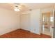 Bedroom featuring light walls, wood flooring, and standard closet at 1612 Blue Lake Cir, Punta Gorda, FL 33983
