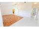 Bright living room featuring tile and wood flooring with views to other rooms at 1612 Blue Lake Cir, Punta Gorda, FL 33983