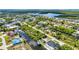Amazing aerial view features homes along waterways, lush greenery, private boat docks, and a fantastic location at 17368 Skipper Ln, Port Charlotte, FL 33948