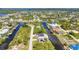 Stunning aerial view of waterfront homes along canals with boat docks in a beautiful residential neighborhood at 17368 Skipper Ln, Port Charlotte, FL 33948