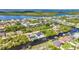 Wide aerial panorama of waterfront houses, numerous boat docks, and interconnected canals in a stunning community at 17368 Skipper Ln, Port Charlotte, FL 33948