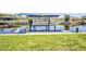 Boat on a lift at a private dock, offering waterfront living with easy access to the water at 17368 Skipper Ln, Port Charlotte, FL 33948