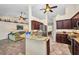 Spacious kitchen with granite countertops that open to the living room at 17368 Skipper Ln, Port Charlotte, FL 33948