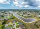 High-angle aerial view highlighting the property's location within a waterfront community with scenic views at 2168 Calcutta Rd, Punta Gorda, FL 33983