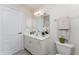 Bathroom featuring a vanity with a mirror, medicine cabinet, and towel bar at 2168 Calcutta Rd, Punta Gorda, FL 33983
