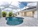 Lovely pool with a large lanai in a screen enclosure providing seamless indoor/outdoor living at 2168 Calcutta Rd, Punta Gorda, FL 33983