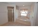 Bathroom featuring tub, tiled floor and glass shower at 23090 Ambassador Ave, Port Charlotte, FL 33954