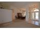 Open-concept layout showcasing a spacious living room and dining area, perfect for entertaining and Gathering gatherings at 23090 Ambassador Ave, Port Charlotte, FL 33954
