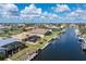 Waterfront home with a private dock, boat lift, and screened lanai, providing easy access to open water at 2526 Rio Plato Dr, Punta Gorda, FL 33950