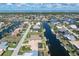 Aerial view of waterfront homes in a residential neighborhood with access to the Gulf at 2526 Rio Plato Dr, Punta Gorda, FL 33950