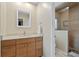 Bathroom with a modern vanity, quartz countertop, and glass-enclosed shower at 2526 Rio Plato Dr, Punta Gorda, FL 33950