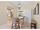 Bright dining area featuring view of backyard with sliding glass doors at 2526 Rio Plato Dr, Punta Gorda, FL 33950