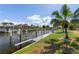 Dock on a waterfront home features a boat lift for easy access to the canal at 2526 Rio Plato Dr, Punta Gorda, FL 33950