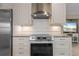 Updated kitchen featuring stainless steel range and custom cabinets at 2526 Rio Plato Dr, Punta Gorda, FL 33950