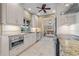 Bright kitchen featuring stainless steel appliances and view into the dining area at 2526 Rio Plato Dr, Punta Gorda, FL 33950