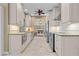 Kitchen featuring stainless appliances, granite countertops, and white cabinetry, ready for culinary adventures at 2526 Rio Plato Dr, Punta Gorda, FL 33950