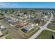 Wide aerial view of the property and surrounding neighborhood, highlighting the home's location at 25308 Rupert Rd, Punta Gorda, FL 33983