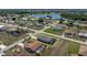 Aerial view highlighting the property's pool and surrounding neighborhood at 25308 Rupert Rd, Punta Gorda, FL 33983