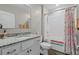 This bathroom has granite countertops, a tub-shower combo and great lighting at 25308 Rupert Rd, Punta Gorda, FL 33983