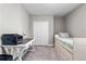 This bedroom boasts a desk, built in storage and closet space at 25308 Rupert Rd, Punta Gorda, FL 33983