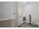 Laundry room with full size washer and dryer at 25308 Rupert Rd, Punta Gorda, FL 33983