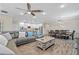 Spacious living room seamlessly connects to the dining area and kitchen, perfect for gatherings at 25308 Rupert Rd, Punta Gorda, FL 33983