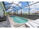 Screened lanai showcasing a private pool and spa with ample seating, perfect for relaxation and entertainment at 25308 Rupert Rd, Punta Gorda, FL 33983