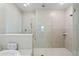 Bathroom features a glass walk-in shower, tile surround and rain shower head at 25308 Rupert Rd, Punta Gorda, FL 33983