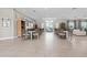 Community clubhouse area with lots of tables for residents to gather and socialize at 25312 E Lenox Cir, Punta Gorda, FL 33950