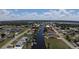 Community view shows canal-front homes with boat docks and easy access to the open water at 27193 And 27197 Voyageur Dr, Punta Gorda, FL 33983