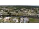Waterfront properties line a canal providing a lifestyle of boating and serene living at 27193 And 27197 Voyageur Dr, Punta Gorda, FL 33983