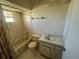 Cozy bathroom featuring a shower-tub combo and a classic vanity sink at 27193 And 27197 Voyageur Dr, Punta Gorda, FL 33983