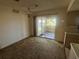 Cozy dining area with sliding glass doors to the screened lanai, inviting outdoor living at 27193 And 27197 Voyageur Dr, Punta Gorda, FL 33983
