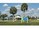 Harbour Heights Park featuring picnic pavilions, playground and park signage, great spot to relax at 27193 And 27197 Voyageur Dr, Punta Gorda, FL 33983