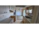 Functional kitchen with ample cabinetry and counter space, ready for your personal touches at 27193 And 27197 Voyageur Dr, Punta Gorda, FL 33983
