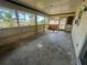 Spacious screened-in lanai with views of the canal, perfect for enjoying the Florida lifestyle at 27193 And 27197 Voyageur Dr, Punta Gorda, FL 33983