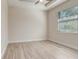 Bright bedroom featuring wood-look tile flooring and a ceiling fan at 2955 Carmela Ave, North Port, FL 34286