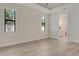 Bedroom with natural light and an ensuite bathroom at 2955 Carmela Ave, North Port, FL 34286