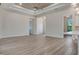 Bright living room showcasing tile flooring, and large open floor plan at 2955 Carmela Ave, North Port, FL 34286
